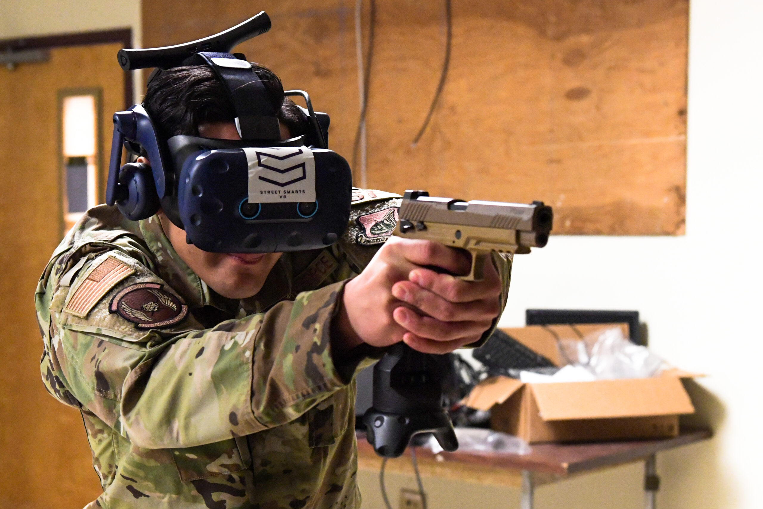 US Security Forces Squadron defender trains on virtual reality system.