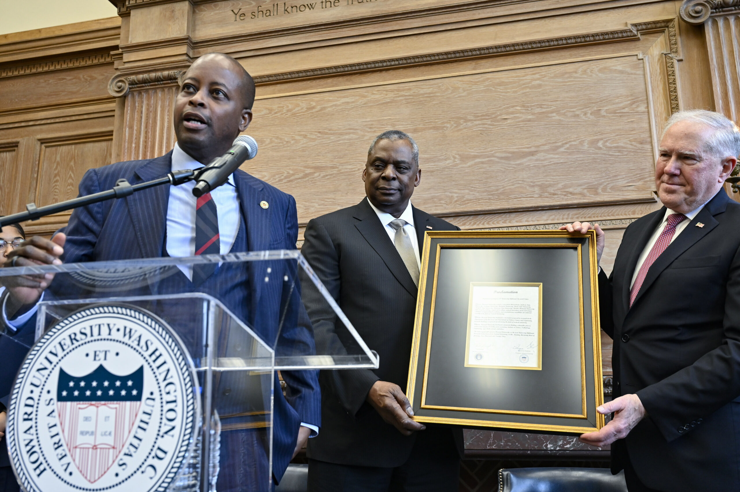 Howard University President Dr. Wayne Frederick, left, Secretary of Defense Lloyd Austin and Secretary of the Air Force Frank Kendall hold a proclamation announcing the partnership of Howard University as an Air Force university affiliated research center during a ceremony at the university in Washington, D.C., Jan. 23, 2023. (U.S. Air Force photo by Eric Dietrich)