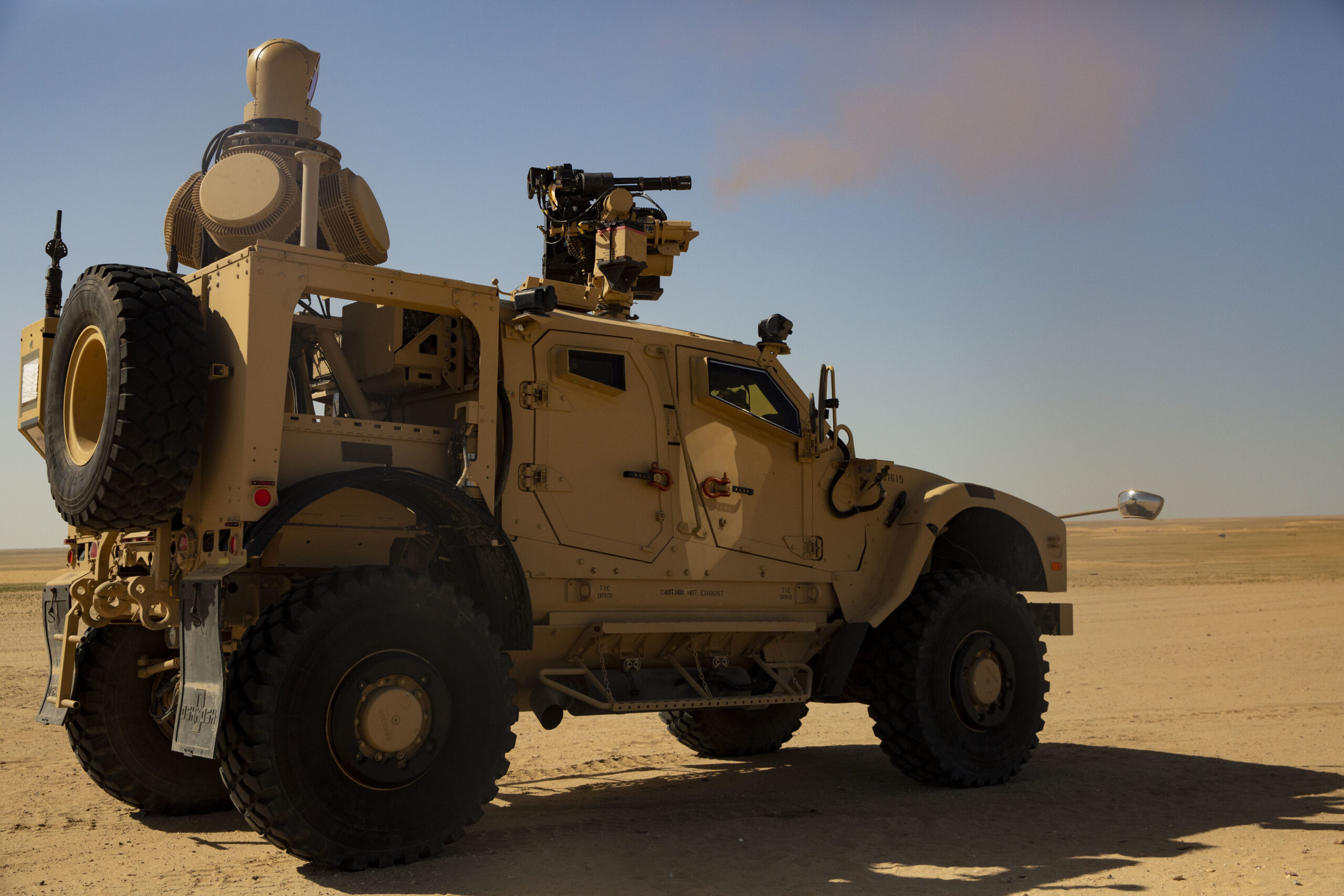 U.S. Marines with 2nd Low Altitude Air Defense Battalion Counter-Unmanned Aerial Systems Detachment, attached to Special Purpose Marine Air-Ground Task Force Crisis Response-Central Command, fire the Marine Air Defense Integrated System Mine Resistant Ambush Protected Vehicle during a live-fire range in southwest Asia Feb. 18, 2019. The MADIS is the first vehicle to utilize kinetic and non-kinetic measures to disable Counter-Unmanned Aerial Systems. SPMAGTF-CR-CC is specifically designed to be capable of deploying aviation, ground, and logistics forces forward at a moment’s notice. (U.S. Marine Corps photo by Lance Cpl. Jack C. Howell)