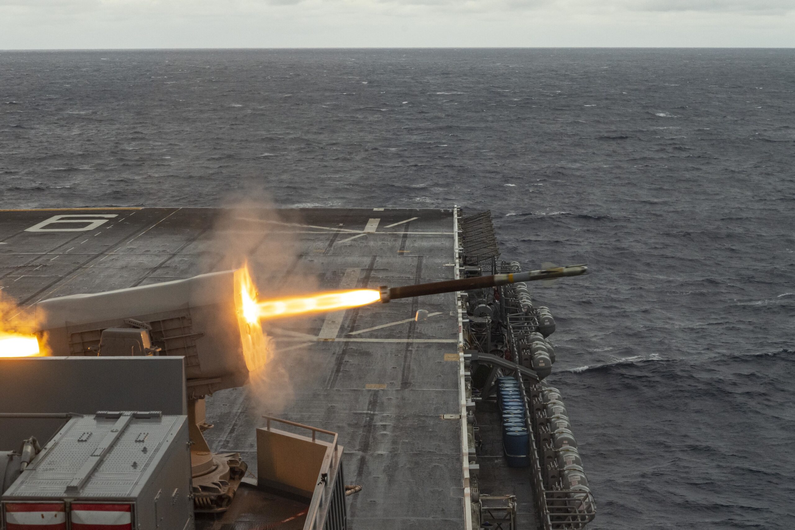 PHILIPPINE SEA (Jan. 24, 2023) The forward-deployed amphibious assault carrier, USS America (LHA 6), fires a RIM-116 Rolling Airframe Missile during routine operations while underway in the Philippine Sea, Jan. 24. America, lead ship of the America Amphibious Ready Group, is operating in the 7th Fleet area of operations. 7th Fleet is the U.S. Navy’s largest forward-deployed numbered fleet, and routinely interacts and operates with Allies and partners in preserving a free and open Indo-Pacific region. (Photo by Mass Communication Specialist 3rd Class Thomas B. Contant)