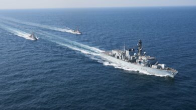 HMS Lancaster sails with USS Monsoon and Chinook in the Strait of Hormuz