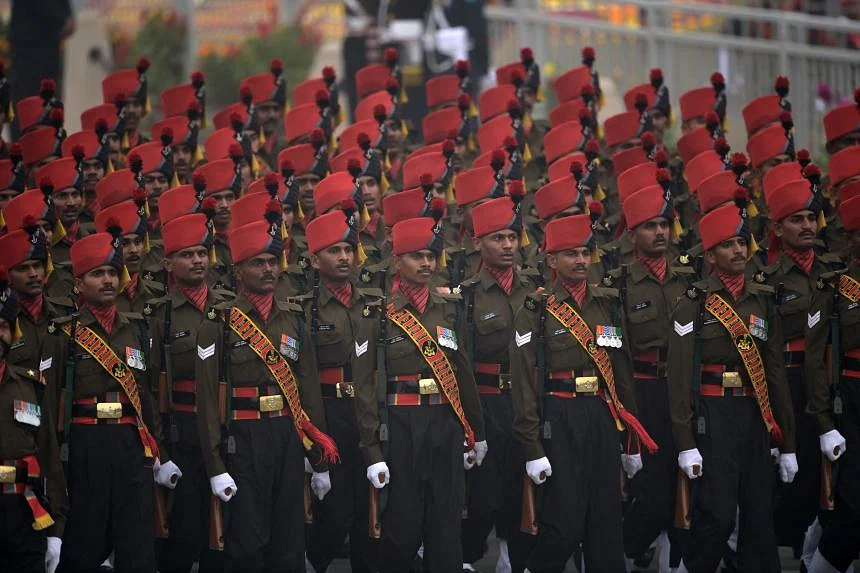 Indian soldiers march past during the Republic Day parade in New Delhi on January 26, 2023
