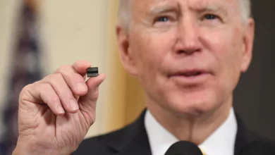 President Biden holds a semiconductor chip