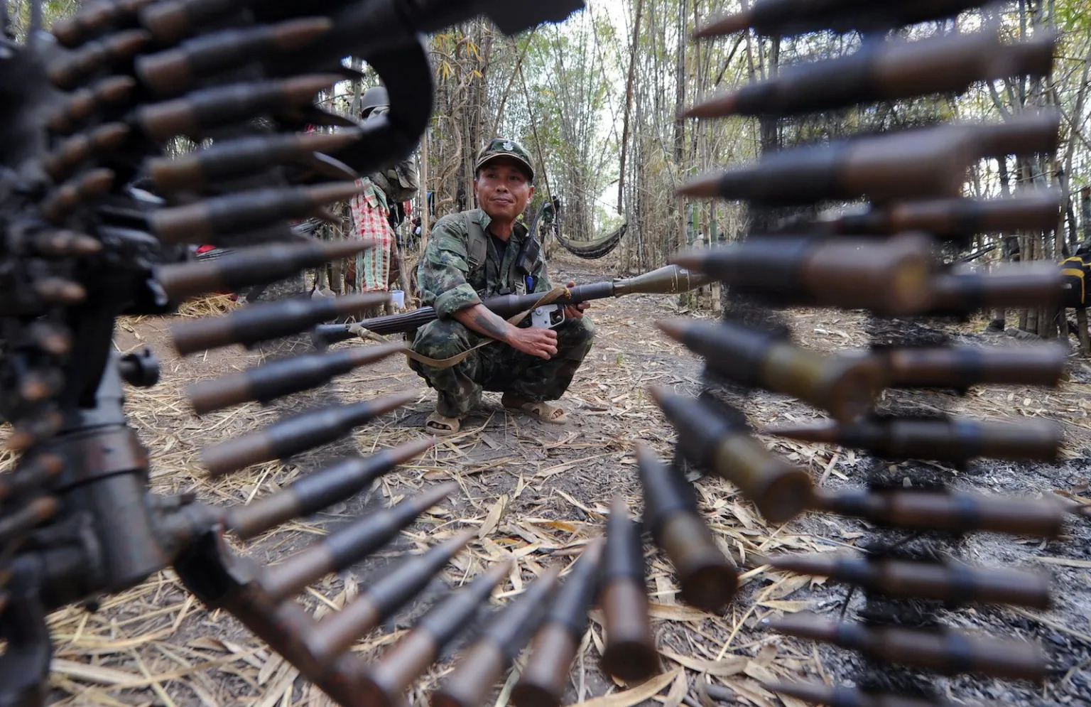 A Karen fighter holds a rocket launcher while standing guard at Oo Kray Kee village in Kayin state near the Thai-Myanmar border