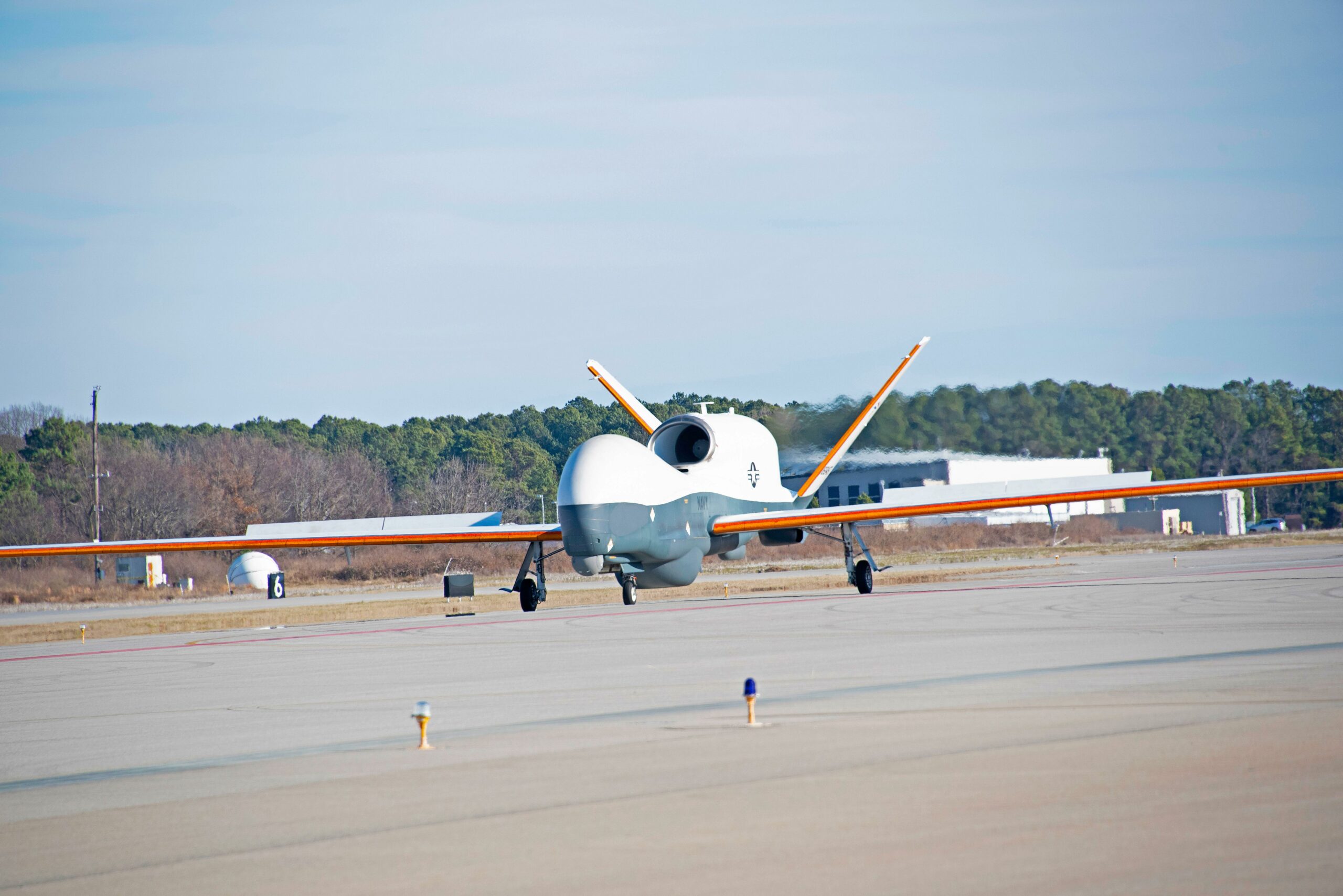 MQ-4C Triton takes off for ice wing accumulation test.