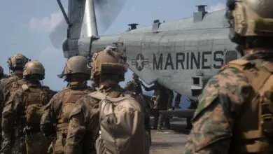 US Marines exfiltrate towards a CH-53E Super Stallion during a simulated visit, board, search, and seizure mission aboard dock landing ship USS Germantown in the South China Sea, 2020