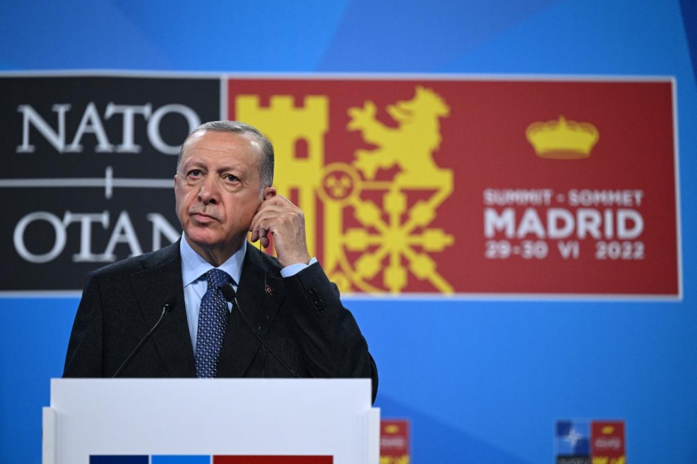 Turkey's President Recep Tayyip Erdogan addresses media representatives during a press conference