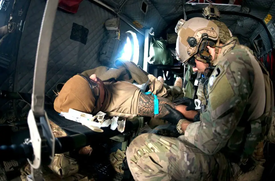 U.S. Air Force pararescue Airmen conduct in-flight medical training scenarios Nov. 6, 2018 at Bagram Airfield, Afghanistan. The 83rd rescue squadron had volunteers from around the wing to simulate injuries in order to create a realistic training scenario on the aircraft. (U.S. Air Force photo by Senior Airman Rito Smith)