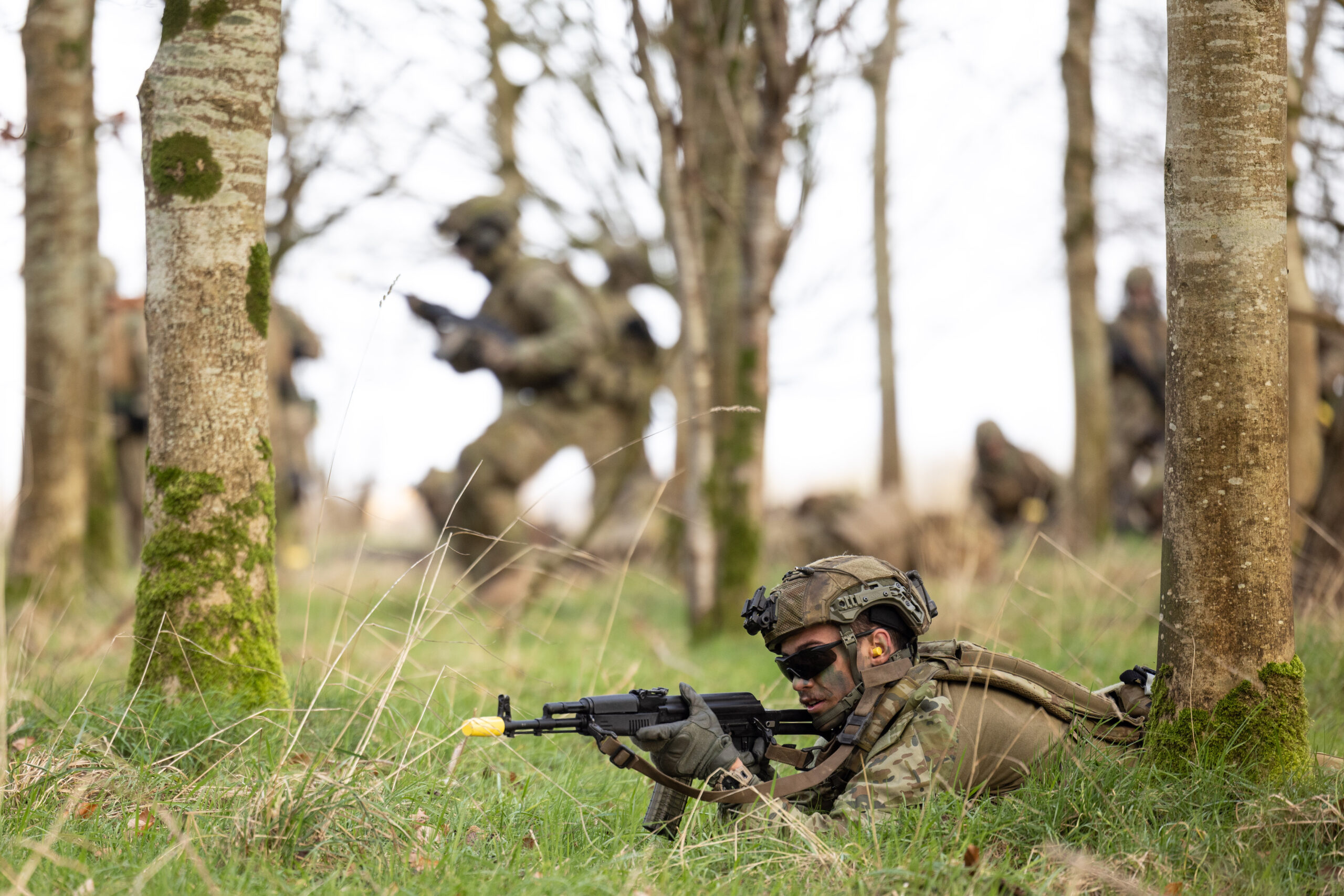 Australian Army soldiers from the 5th Battalion, Royal Australian Regiment, perform a section attack to demonstrate fire and movement during the first rotation of Operation Kudu in the United Kingdom. *** Local Caption *** Australia continues to stand with the people of Ukraine, and is providing ongoing support in response to Russias continuing violation of international law. Having arrived the United Kingdom in January 2023, a contingent of up to 70 ADF personnel have joined partner nations in the UK-led and based training programme for Ukrainian recruits.