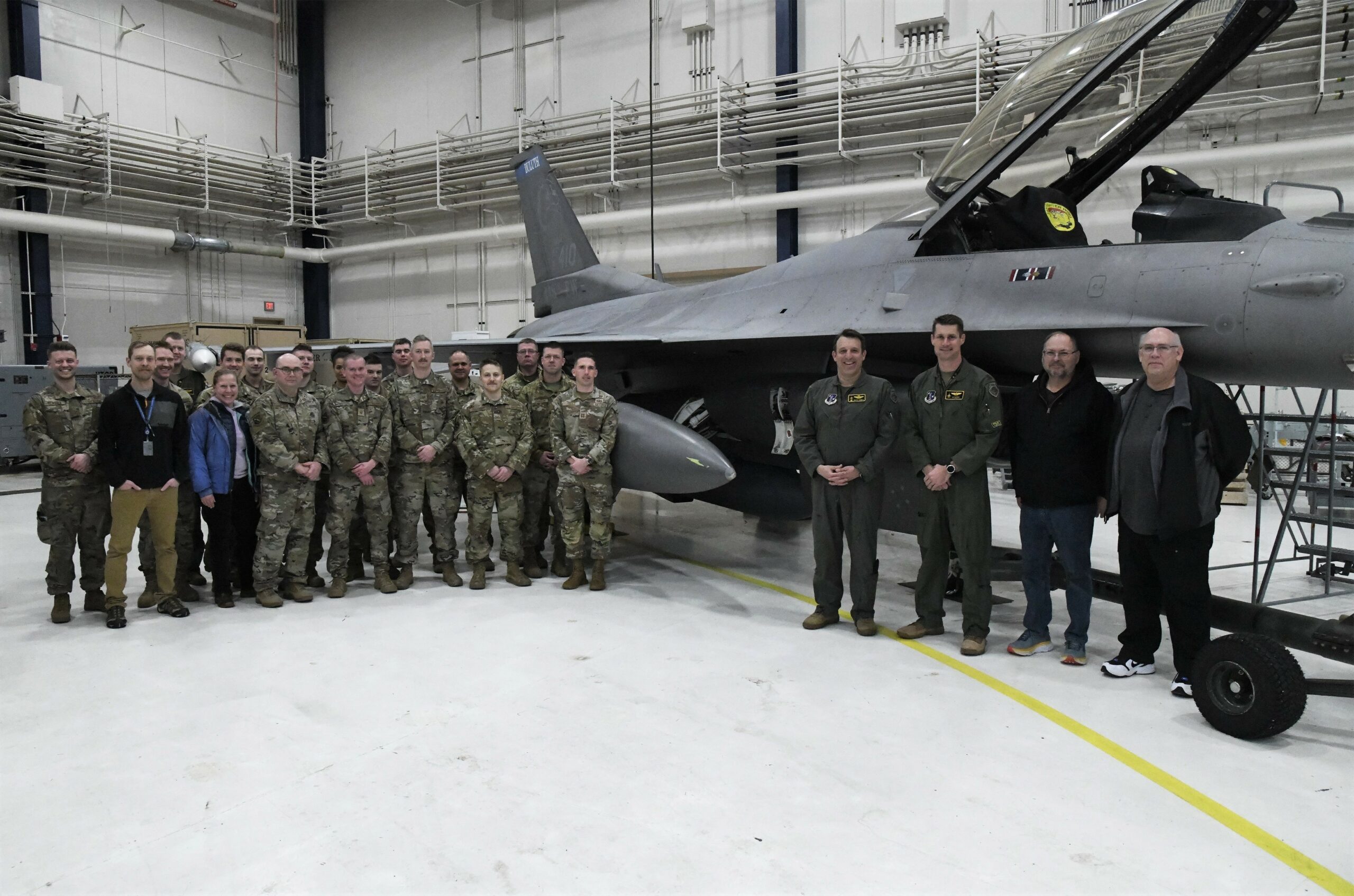 Subject matter experts from Air Combat Command, Air Force Materiel Command, the Air National Guard, Air Force Life Cycle Management Center, Air Force Reserve Test Center (AATC) and 148th Fighter Wing pose for a photo after the first AN/ASQ-236 radar was installed on an Block 50 F-16 Fighting Falcon on January 25, 2023. The 148th Fighter Wing has been designated as the Air National Guard’s Center for Excellence for all F-16 fighter aircraft. (U.S. Air National Guard photo by Audra Flanagan)