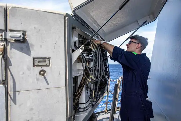 PACIFIC OCEAN (June 4, 2021) – Cryptologic Technician Technical 2nd Class Ryan Smith, from Cave Creek, Ariz., conducts maintenance on an SLQ-32 electronic warfare suite aboard the Arleigh Burke-class guided-missile destroyer USS Halsey (DDG 97). Halsey is attached to Commander, Task Force 70/Carrier Strike Group 5 conducting underway operations in support of a free and open Indo-Pacific. (U.S. Navy photo by Mass Communication Specialist 3rd Class Jaimar Carson Bondurant)
