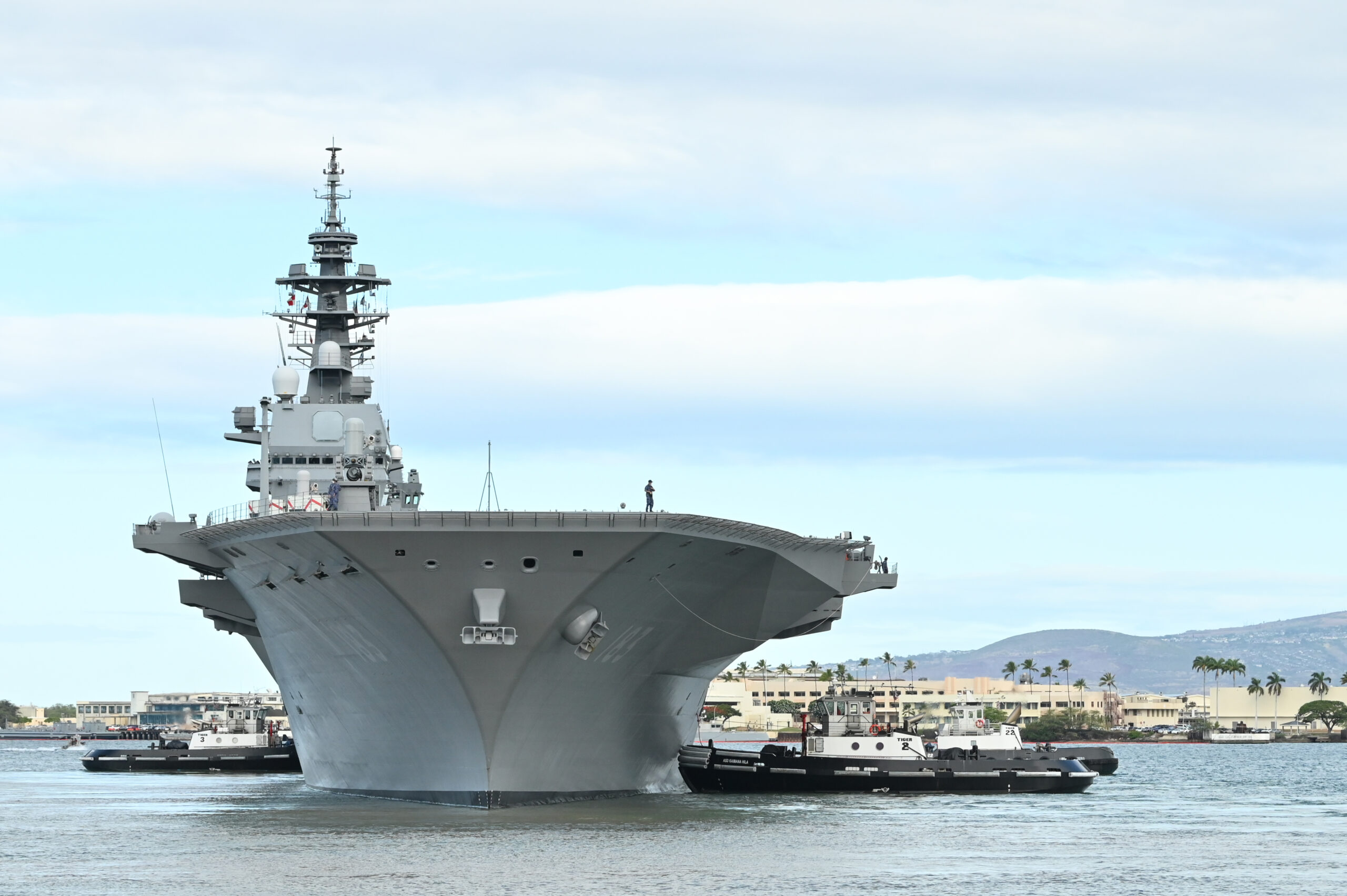 PEARL HARBOR (July 12, 2022) Japan Maritime Self-Defense Force helicopter destroyer JS Izumo (DDH 183) departs Pearl Harbor, July 12, to participate in the at-sea phase as part of Rim of the Pacific (RIMPAC) 2022. Twenty-six nations, 38 ships, three submarines, more than 170 aircraft and 25,000 personnel are participating in RIMPAC from June 29 to Aug. 4 in and around the Hawaiian Islands and Southern California. The world's largest international maritime exercise, RIMPAC provides a unique training opportunity while fostering and sustaining cooperative relationships among participants critical to ensuring the safety of sea lanes and security on the world's oceans. RIMPAC 2022 is the 28th exercise in the series that began in 1971. (Japan Maritime Self-Defense Force photo by Petty Officer 3rd Class Suga Tatsuya)