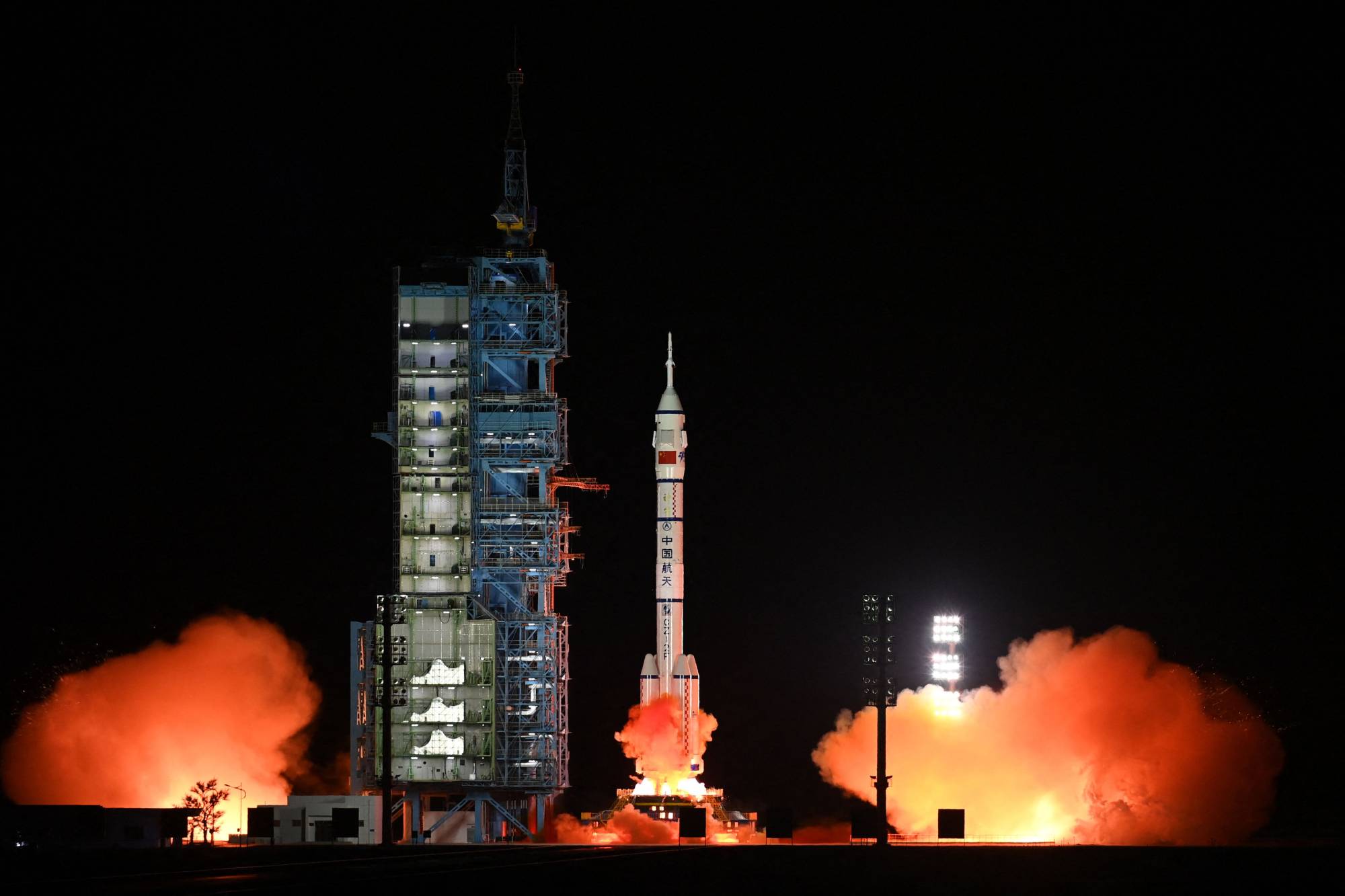 A Long March-2F rocket, carrying the Shenzhou-15 spacecraft with three astronauts to China's Tiangong space station, lifts off from the Jiuquan Satellite Launch Center in northwest China's Gansu province.