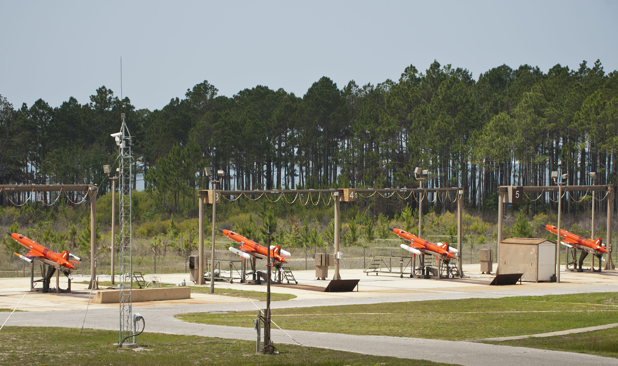 Four BQM-167s rest on their launch rails, positioned toward the Gulf of Mexico prior to launch May 12 at Tyndall Air Force Base, Fla. This subscale target is used for live weapon system evaluations and testing. The 82nd Aerial Targets Squadron operates QF-4, QF-16 and BQM-167 targets to provide manned and unmanned aerial targets support for programs across the Department of Defense. (U.S. Air Force photo/Sara Vidoni)