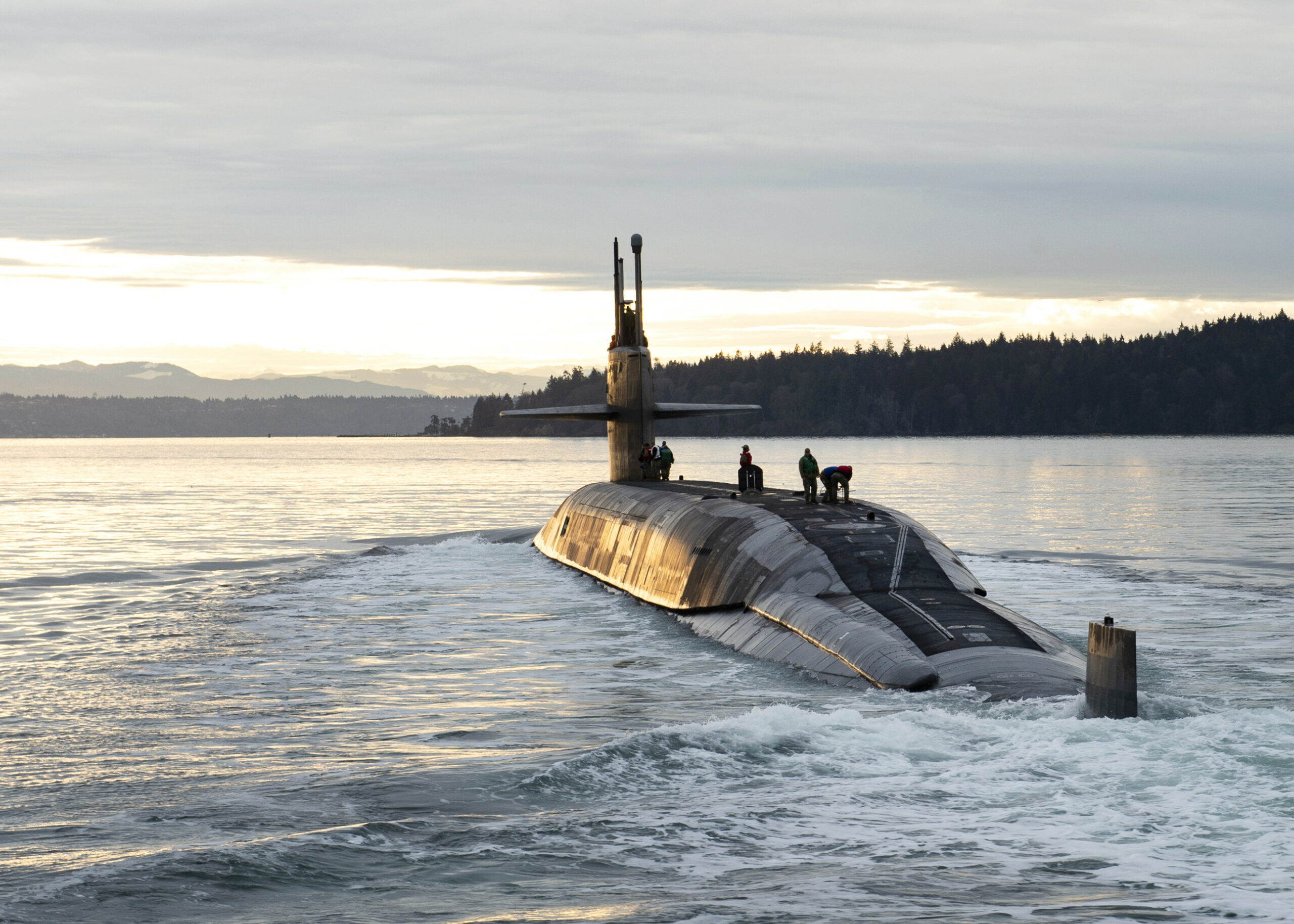 The Ohio-class ballistic missile submarine USS Louisiana (SSBN 743) transits Puget Sound following a 41-month engineered refueling overhaul at Puget Sound Naval Shipyard and Intermediate Maintenance Facility, Feb. 9, 2023. Louisiana is one of eight ballistic-missile submarines stationed at Naval Base Kitsap-Bangor, providing the most survivable leg of the strategic deterrence triad for the United States. (U.S. Navy photo by Mass Communication Specialist 1st Class Brian G. Reynolds)