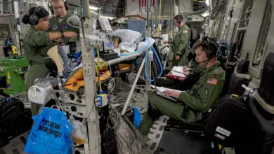 Critical care air transport teams and aeromedical evacuation teams provide medical care and attention to patients onboard a C-17 Globemaster III from Travis Air Force Base, Calif., after leaving Joint Base Pearl Harbor-Hickam, Hawaii, May 18, 2018. The C-17 was configured by an AE aircrew to provide aerial transport of patients throughout the Pacific region. (U.S. Air Force photo by Lan Kim)