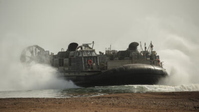 A land craft, air cushioned vessel (LCAC) from the USS Kearsarge (LHD 3) lands on Arta Beach to transport members of the 26th Marine Expeditionary Unit, light armored vehicles and Humvees to the ship during a regular rotation of forces to support maritime security operations, provide crisis response capability, and increase theater security cooperation, Djibouti, May 30, 2013. An LCAC (hovercraft) is used for seamless transport of assets from ship to shore and across the beach. (U.S. Air Force photo by Staff Sgt. Julianne M. Showalter)