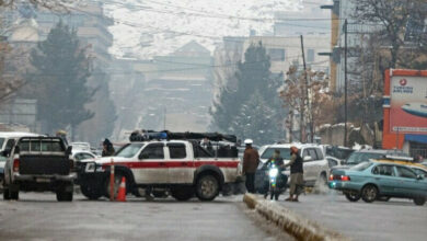 Taliban security forces block a road after a suicide blast near Afghanistan’s foreign ministry at the Zanbaq Square in Kabul on January 11, 2023