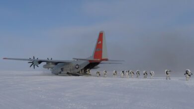 US and Canadian soldiers practice and conduct tactical insertion on an open ice skiway delivered by an LC-130 Hercules