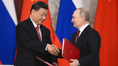 Russian President Vladimir Putin and China's President Xi Jinping shake hands during a signing ceremony following their talks at the Kremlin in Moscow on March 21, 2023