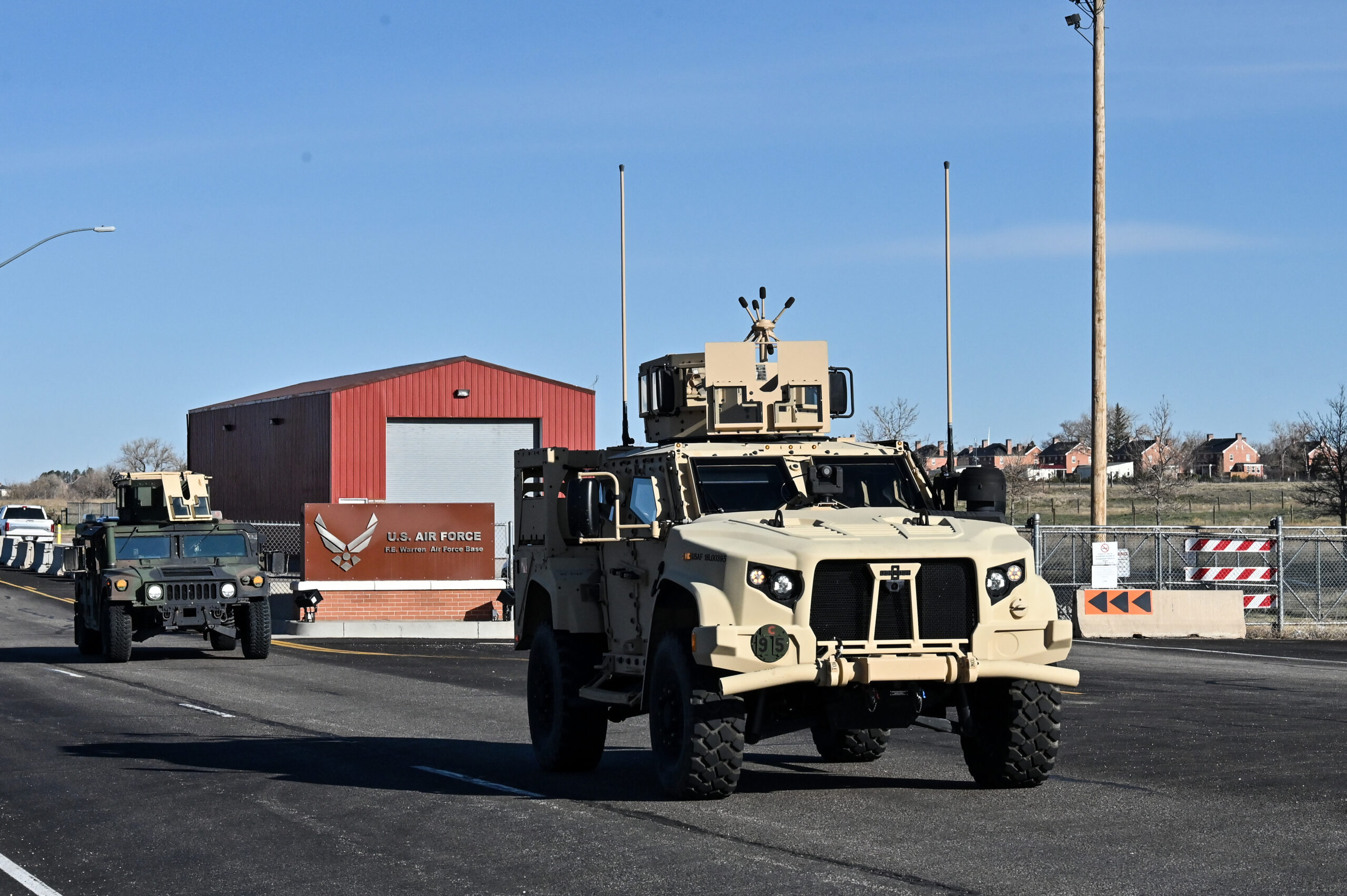 Airmen from the 90th Missile Security Forces Squadron depart F.E. Warren Air Force Base, Wyoming, for the first operational Joint Light Tactical Vehicle mission supporting maintenance at a launch facility near Harrisburg, Nebraska, April 24, 2023. This is the first step in modernizing the security forces vehicle fleet to provide more lethality and security for the nuclear enterprise. (Air Force photo by Joseph Coslett Jr.)