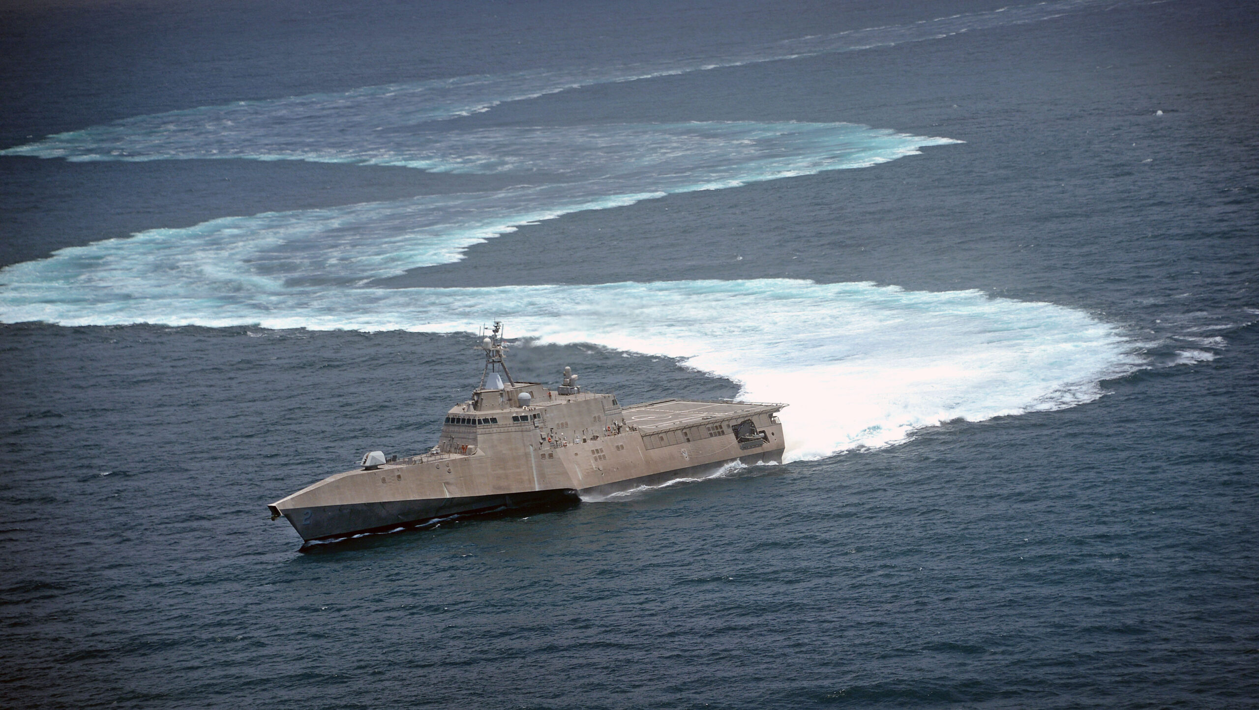 The littoral combat ship USS Independence (LCS 2) demonstrates its maneuvering capabilities in the Pacific Ocean off the coast of San Diego. (U.S. Navy photo by Mass Communication Specialist 2nd Class Daniel M. Young/Released)