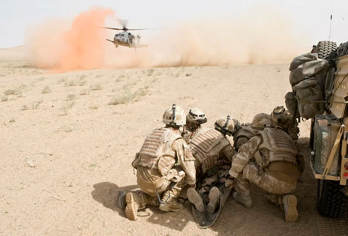 1 RIFLES prepare to evacuate a casualty by helicopter in the Nawa region of Helmand, Afghanistan.