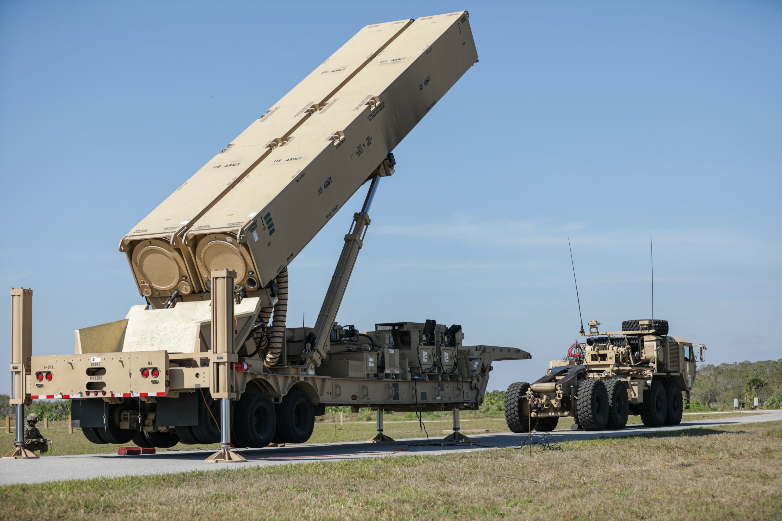 A U.S Army Soldier lifts the hydraulic launching system on the new Long-Range Hypersonic Weapon (LRHW) during Operation Thunderbolt Strike at Cape Canaveral Space Force Station, Florida, March 3, 2023. During the LRHW system development, the Army’s Rapid Capabilities & Critical Technologies Office (RCCTO) implemented a Soldier-centered design concept which uses formal and informal Soldier touch points to obtain early feedback to influence design, speed up development, and ensure an operationally effective weapon system. (Spc. Chandler Coats)