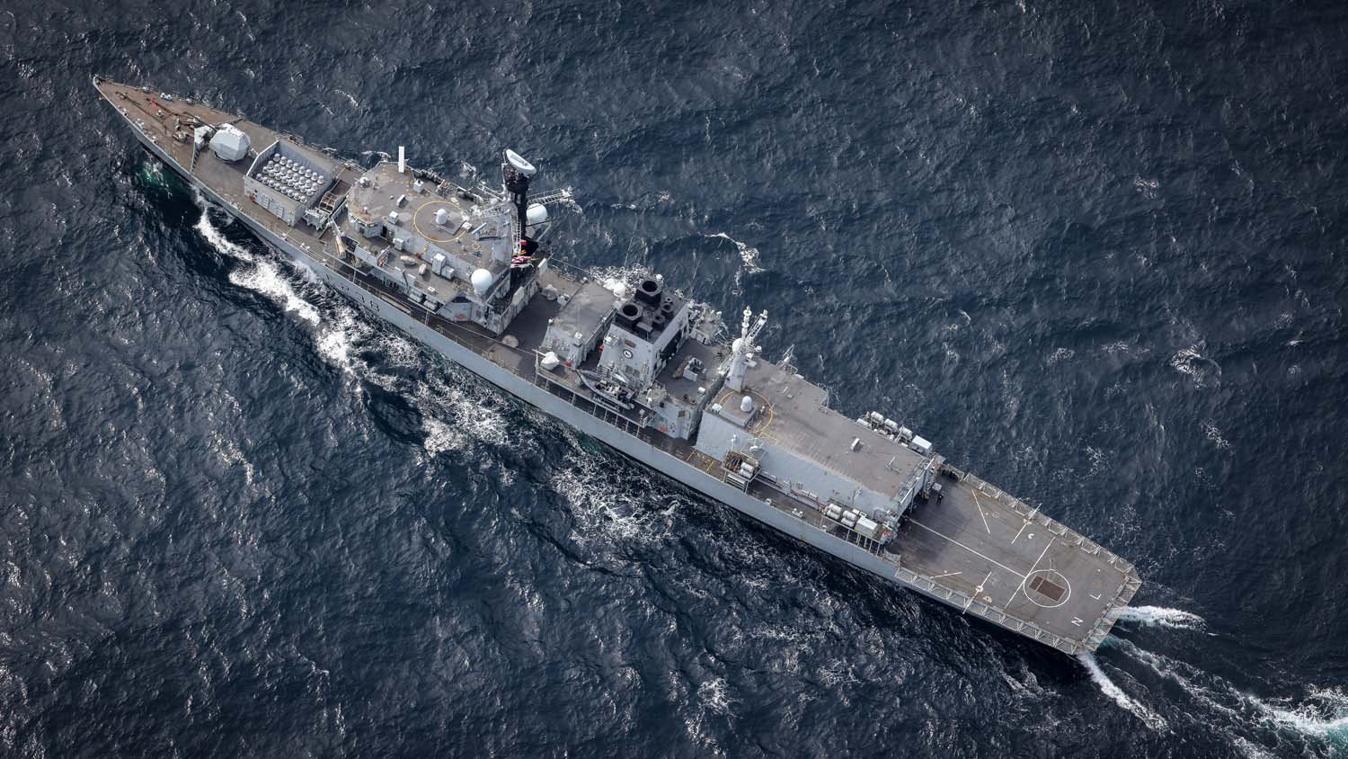 Pictured: HMS Northumberland at sea on operations. HMS Northumberland is a Royal Navy Type 23 frigate, based in Plymouth. She specialises in hunting submarines and currently has a Royal Navy Merlin embarked for her current taskings.