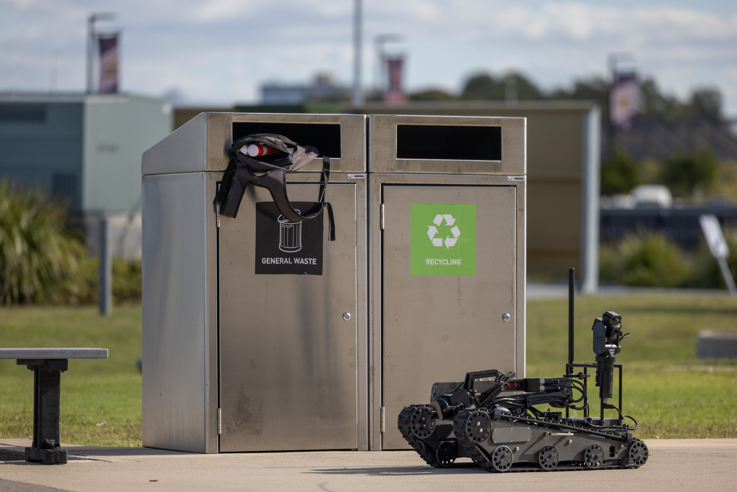 A bomb disposal robot from the Queensland Police Service identifies a suspicious package placed outside of the Country Bank Stadium as part of Exercise Austral Shield 22 in Townsville, Queensland. *** Local Caption *** Exercise Austral Shield 2022 is designed to exercise the Australian Defence Forces short-notice contingency reaction in the execution of Domestic Security Response options to a domestic security threat, in accordance with Part IIIAAA of the Defence Act 1903. Held this year in Townsville, the exercise utilises a Special Operations element and Reserve forces mobilised from Sydney and Brisbane at short notice to assist the Queensland Police Service in the execution of Domestic Security Response against a simulated terror threat. Exercises like Austral Shield are an essential part of maintaining an agile and ready force. The Australian Defence Force maintains short notice and specialist capabilities that may be called upon, under Commonwealth direction, to assist the civilian authorities in responding to violent incidents, including terrorism.