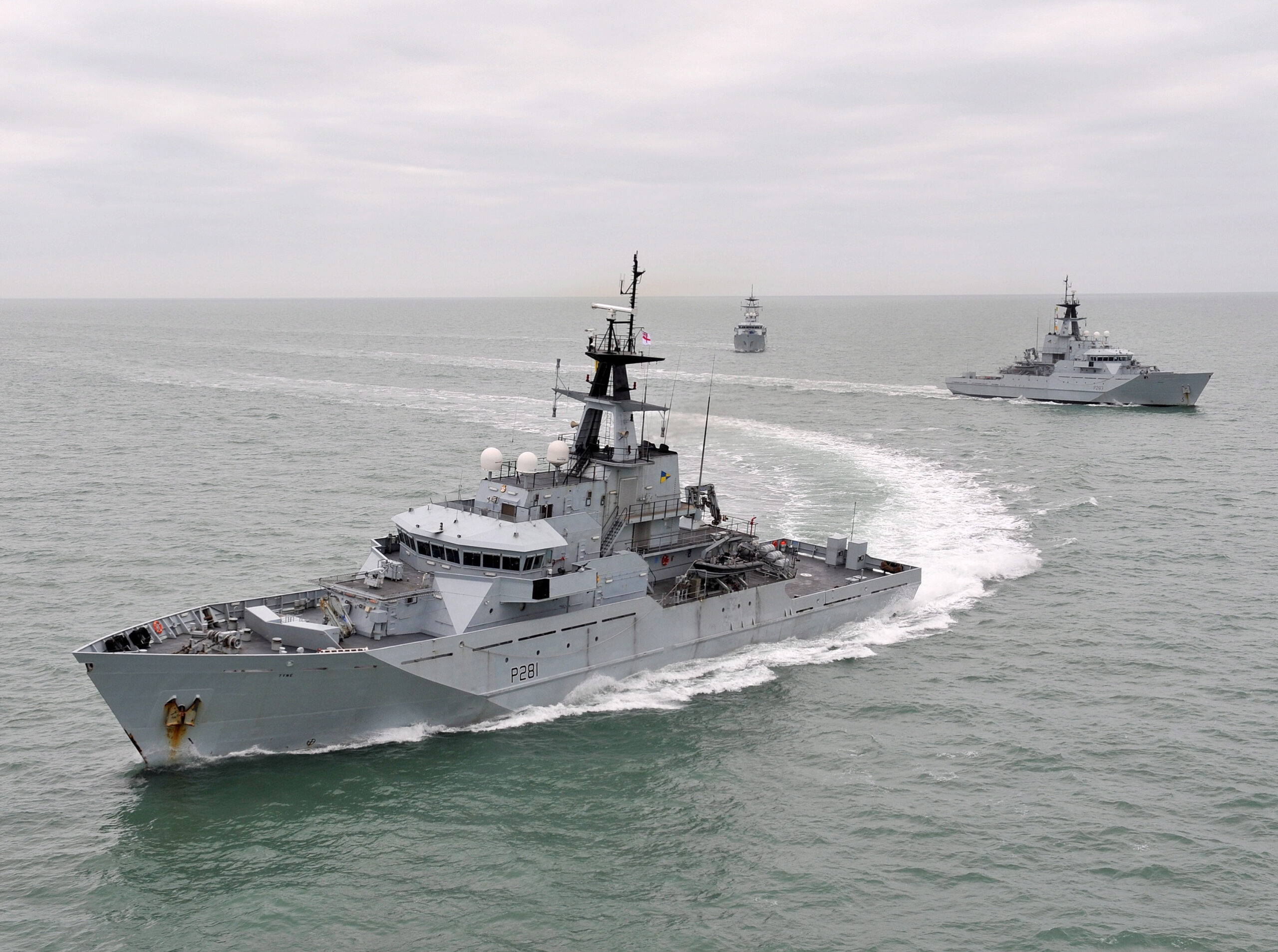 Library Image: The three River-class patrol vessels of the Fishery Protection Squadron, HMS Mersey, HMS Severn and HMS Tyne (foreground) exercising off the coast of Cornwall. FIRST STEEL CUT ON £348 MILLION ROYAL NAVY WARSHIP CONTRACT Steel was cut today for the first of three new Royal Navy offshore patrol vessels (OPVs) at a ceremony in Glasgow attended by the Secretary of State for Scotland and the Ministry of Defence’s (MoD) Chief of Defence Materiel. The vessels, which will be used by the Royal Navy to undertake various tasks in support of UK interests both at home and abroad, will be built at BAE Systems’ shipyards in a contract that has protected more than 800 Scottish jobs.
