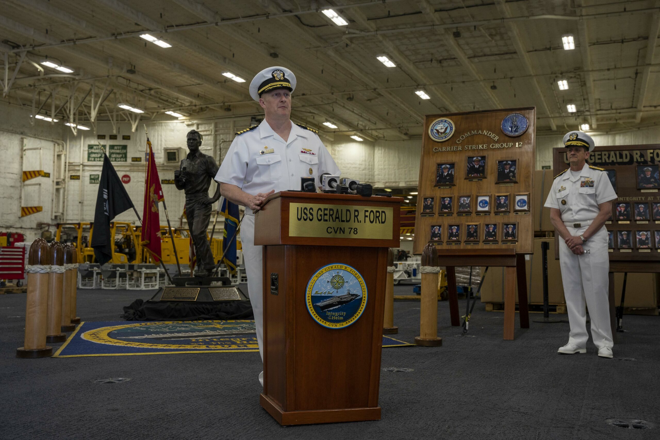 Capt. Rick Burgess, commanding officer of the first-in-class aircraft carrier USS Gerald R. Ford (CVN 78), speaks to media 