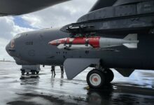 An inert Joint Direct Attack Munition QuickStrike Extended Range mine is attached to a US Air Force B-52H Stratofortress assigned to the 49th Test and Evaluation Squadron, Barksdale Air Force Base, in early March, 2023