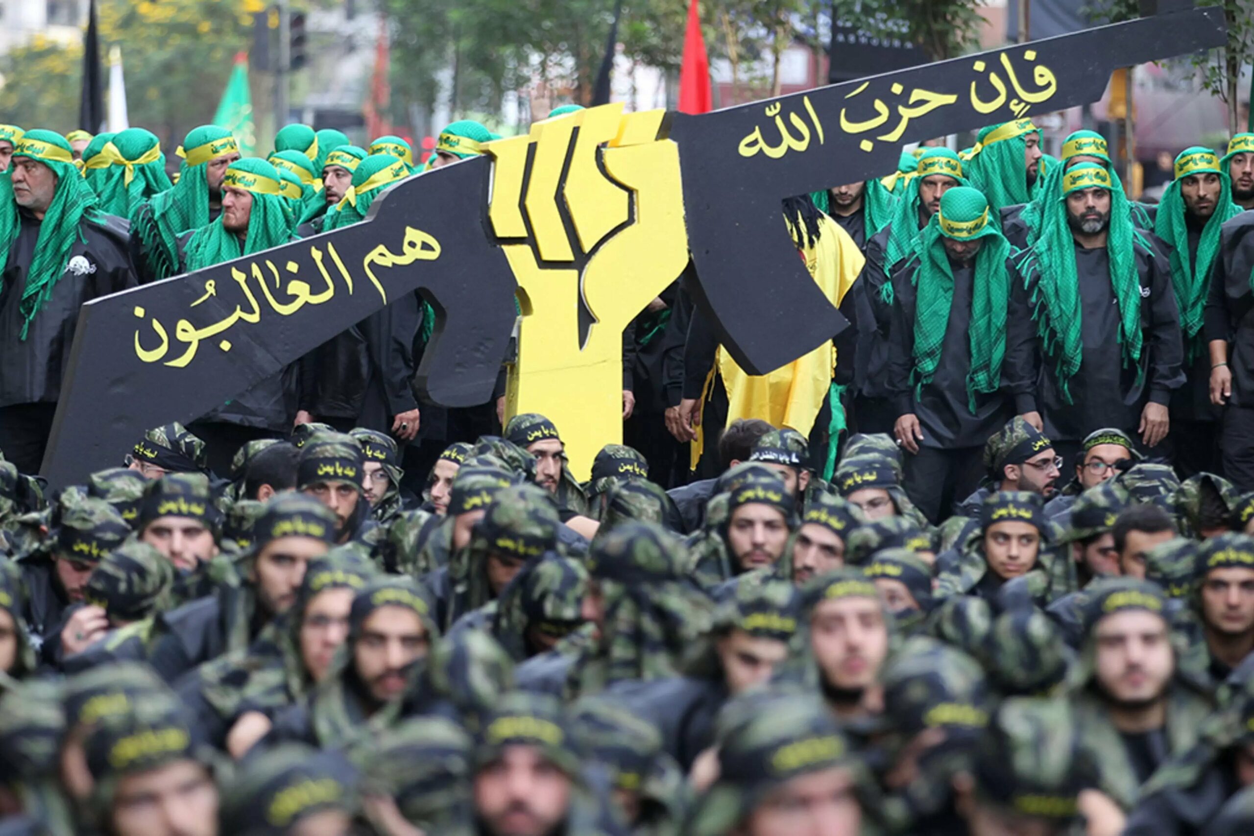 Members of Lebanon’s Hezbollah take part in Ashura commemorations in a southern Beirut suburb