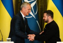NATO head Jens Stoltenberg shakes hands with Ukrainian President Volodymyr Zelensky at the end of a joint press conference in Kyiv, on April 20, 2023, amid the Russian invasion of Ukraine