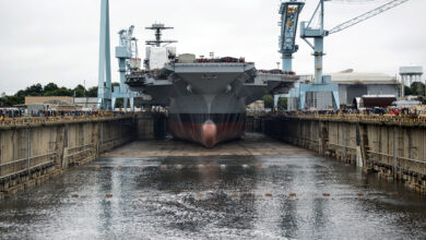Newport News Shipbuilding floods Dry Dock 12 to float the first in class aircraft carrier, Pre-Commissioning Unit Gerald R. Ford (CVN 78). (U.S. Navy photo by Mass Communication Specialist 1st Class Joshua J. Wahl/Released)