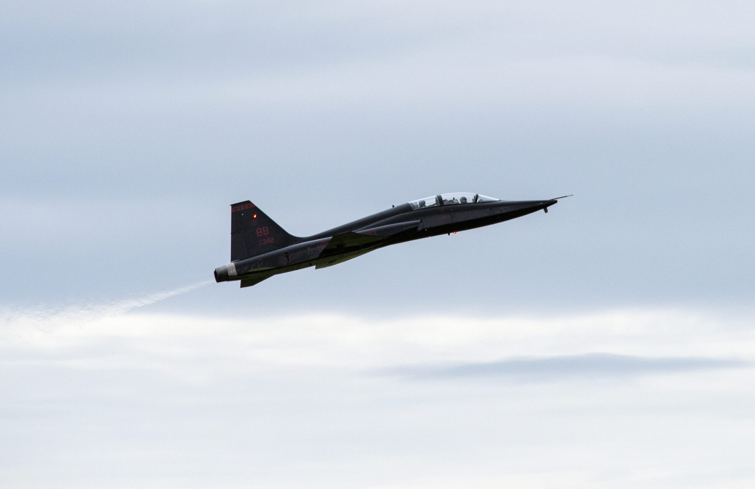 A U.S. Air Force T-38 Talon jet trainer from Beale Air Force Base, California, practices "touch and go" procedures, March 25, 2019 at Travis Air Force Base, California. The Talon is a twin-engine, high-altitude, supersonic aircraft utilized by U-2 “Dragon Lady” pilots to maintain flying proficiency. (U.S. Air Force photo by Heide Couch)