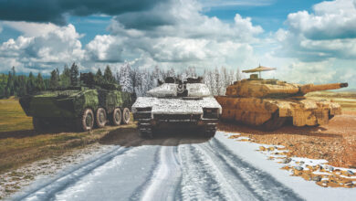 Military vehicles equipped with Barracuda Mobile Camouflage Systems
