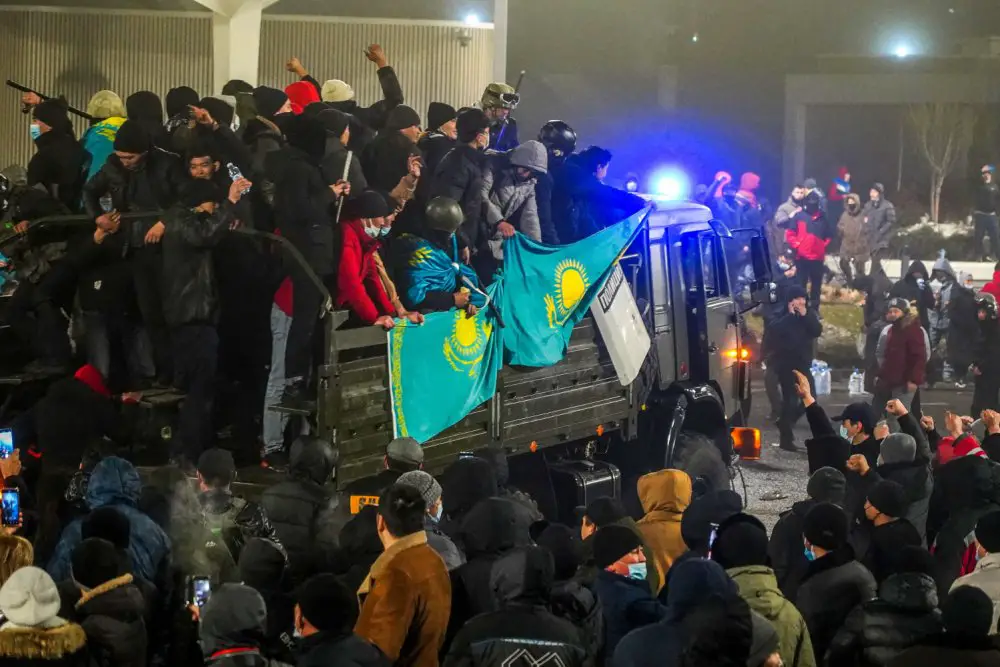 Protesters with flags in Kazakhstan