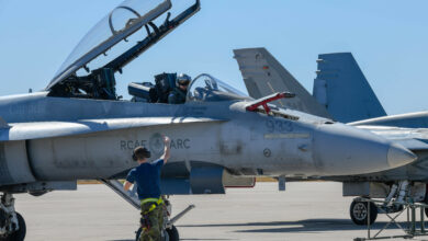 A Royal Canadian air force crew chief, assigned to the 433rd Tactical Fighter Squadron in Canadian Forces Base Bagotville, Quebec, Canada, gives a CF-18 Hornet pilot a thumbs up Feb. 25, 2020, at Luke Air Force Base, Ariz. While at Luke, 140 RCAF personnel and 12 aircraft participated in the Tipic Sauvage and Haboob Havoc exercises and conducted training with the U.S. Air Force. Luke regularly hosts exercises and competitions for pilots to hone their skills in air-to-air and air-to-ground contests as well as build camaraderie. (U.S. Air Force photo by Airman 1st Class Brooke Moeder)