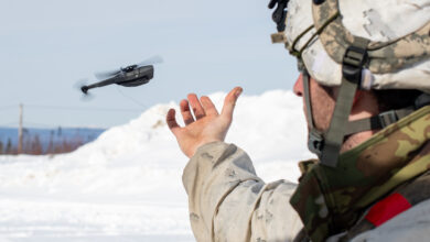U.S. Army Sgt. Nicholas Sutton, an infantryman assigned to the 1st Battalion, 5th Infantry Regiment, 1st Infantry Brigade Combat team, 11th Airborne Division, releases a Black Hornet 3 drone at a remote fighting position during Joint Pacific Multinational Readiness Center-Alaska 23-02 at Yukon Training Area, Alaska, April 3, 2023. JPMRC-AK 23-02, executed in Alaska with its world-class training facilities and its harsh Arctic environment, builds Soldiers and leaders into a cohesive team of skilled, tough, alert, and adaptive warriors capable of fighting and winning anywhere. (U.S. Air Force photo by Senior Airman Patrick Sullivan)