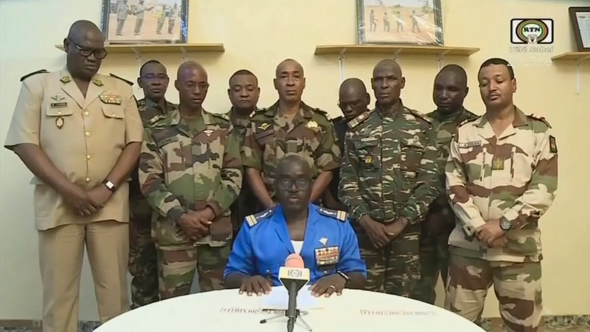 Colonel Major Amadou Abdramane (C), spokesman for the National Committee for the Salvation of the People (CNSP) speaking during a televised statement