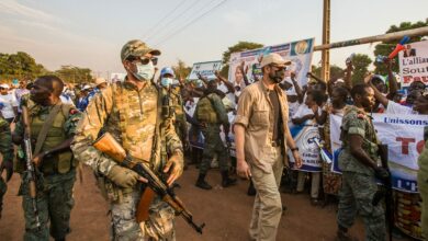 Russian and Rwandan security forces take measures around the site during election meeting in Bangui, Central African Republic