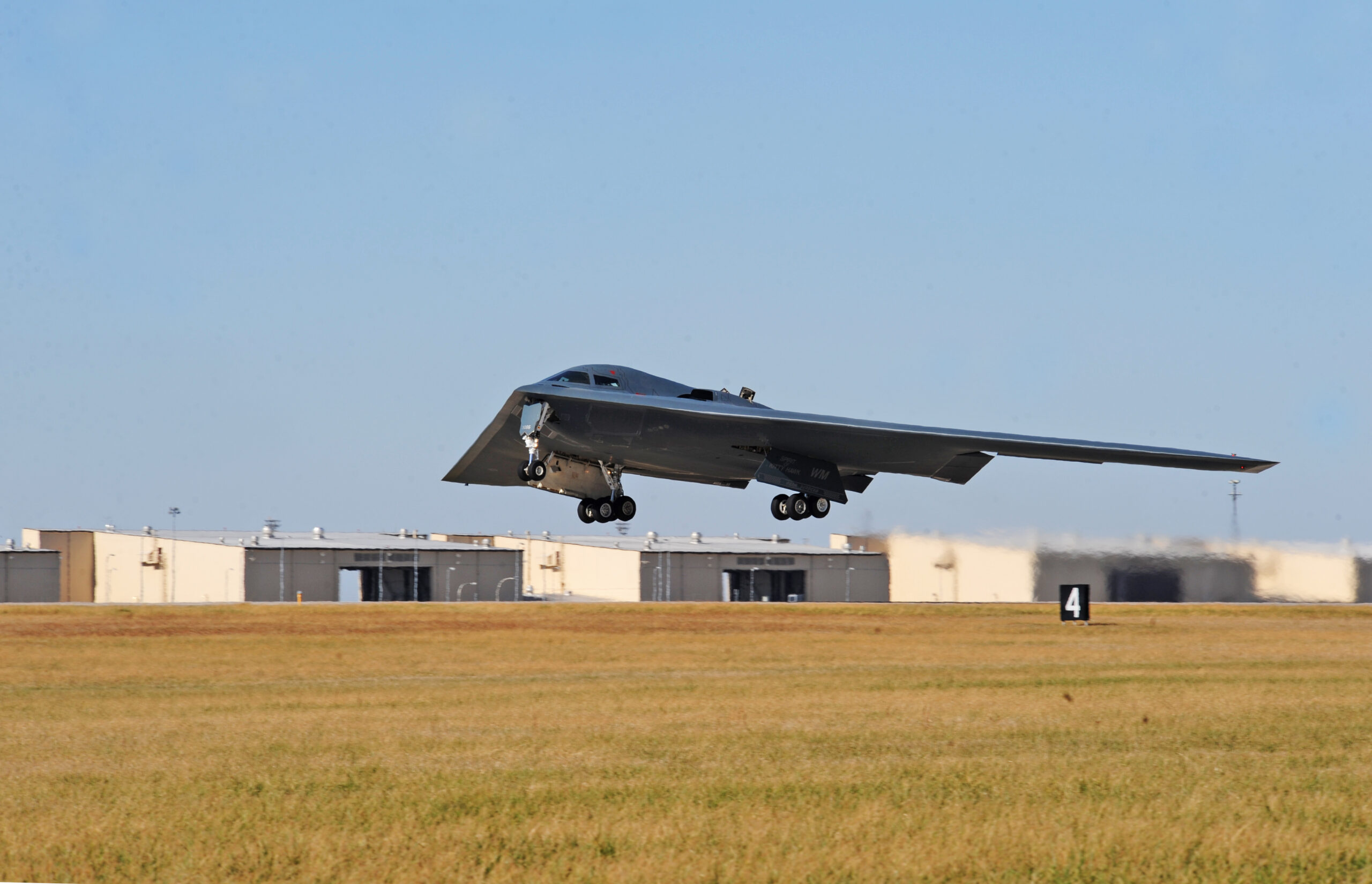 A B-2 Spirit launches from the runway during an exercise at Whiteman Air Force Base, Mo., Nov. 8, 2015. The B-2 Spirit is a multi-role bomber capable of delivering both conventional and nuclear munitions. (U.S. Air Force photo by Tech. Sgt. Miguel Lara III)