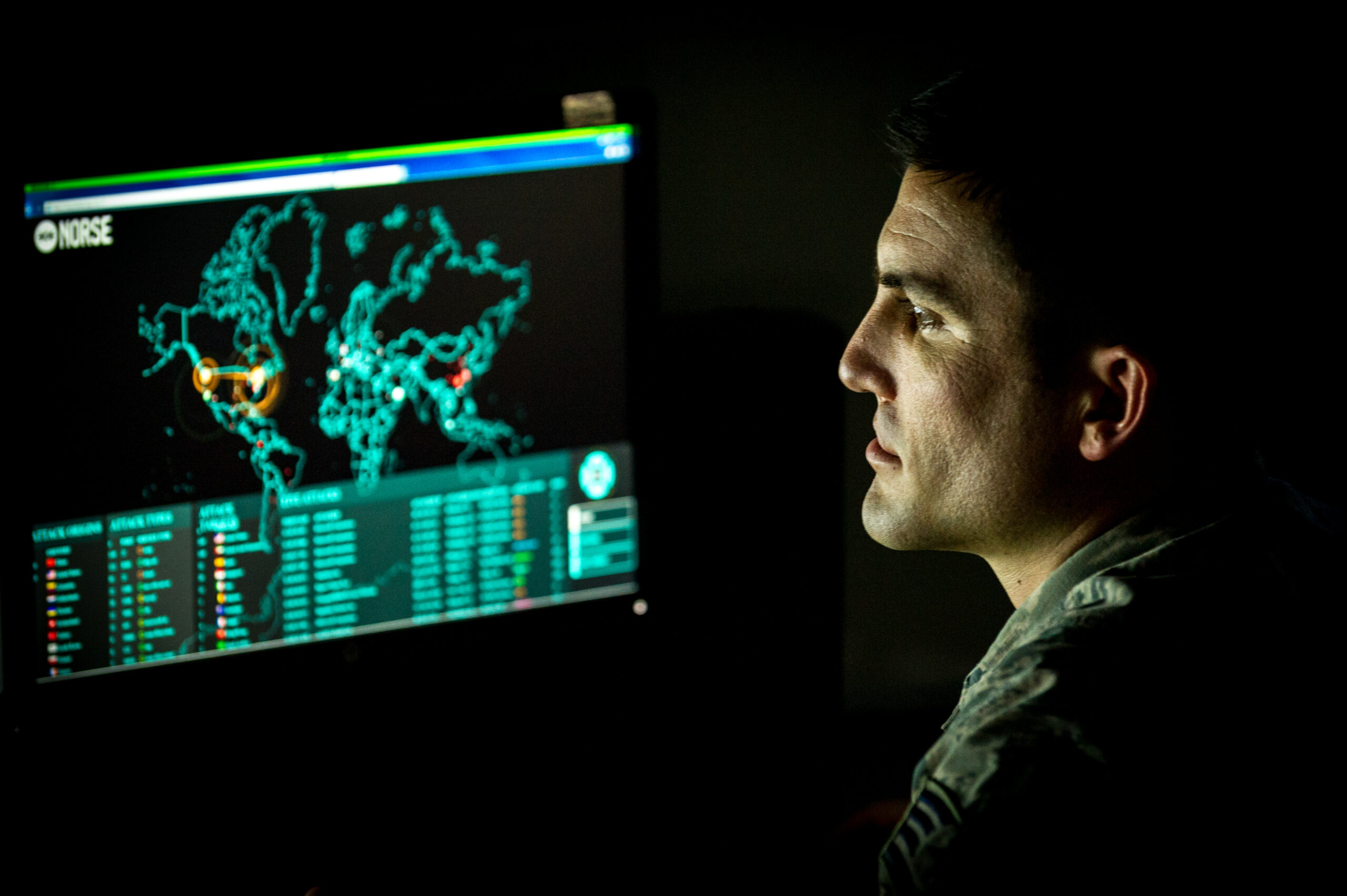 Cyber warfare operations journeyman assigned to the 175th Cyberspace Operations Group of the Maryland Air National Guard monitors live cyber attacks