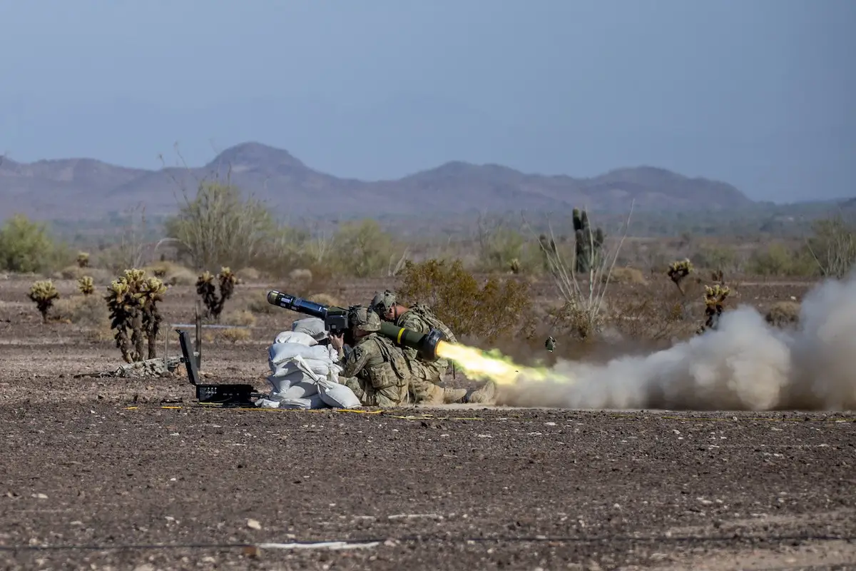 A Javelin missile launch motor ignites as infantryman fire it downrange using the Lightweight Command Launch Unit while operationally testing at Yuma Proving Ground, Arizona