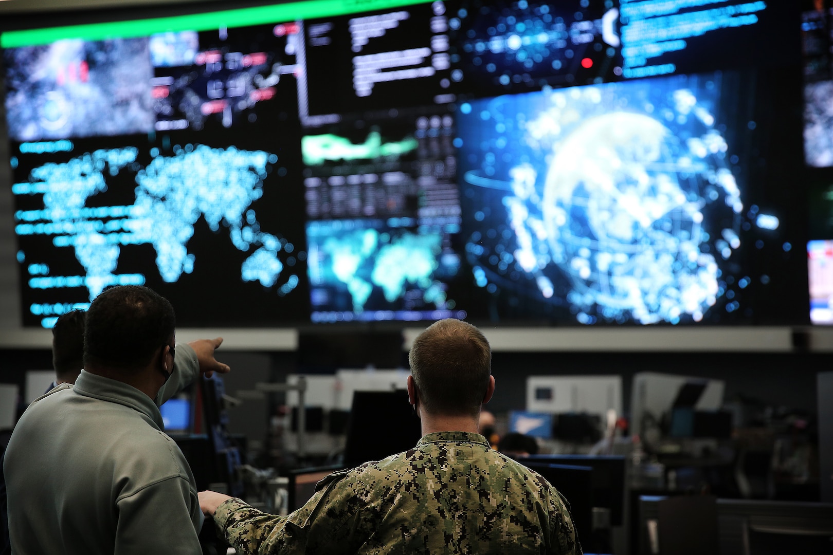 U.S. Cyber Command members work in the Integrated Cyber Center, Joint Operations Center at Fort George G. Meade.