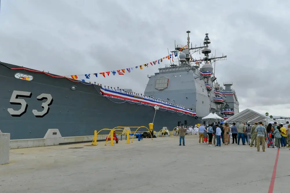 The Ticonderoga-class guided-missile cruiser USS Mobile Bay (CG 53) sits pier side during a decommissioning ceremony. The Mobile Bay was decommissioned after more than 36 years of distinguished service