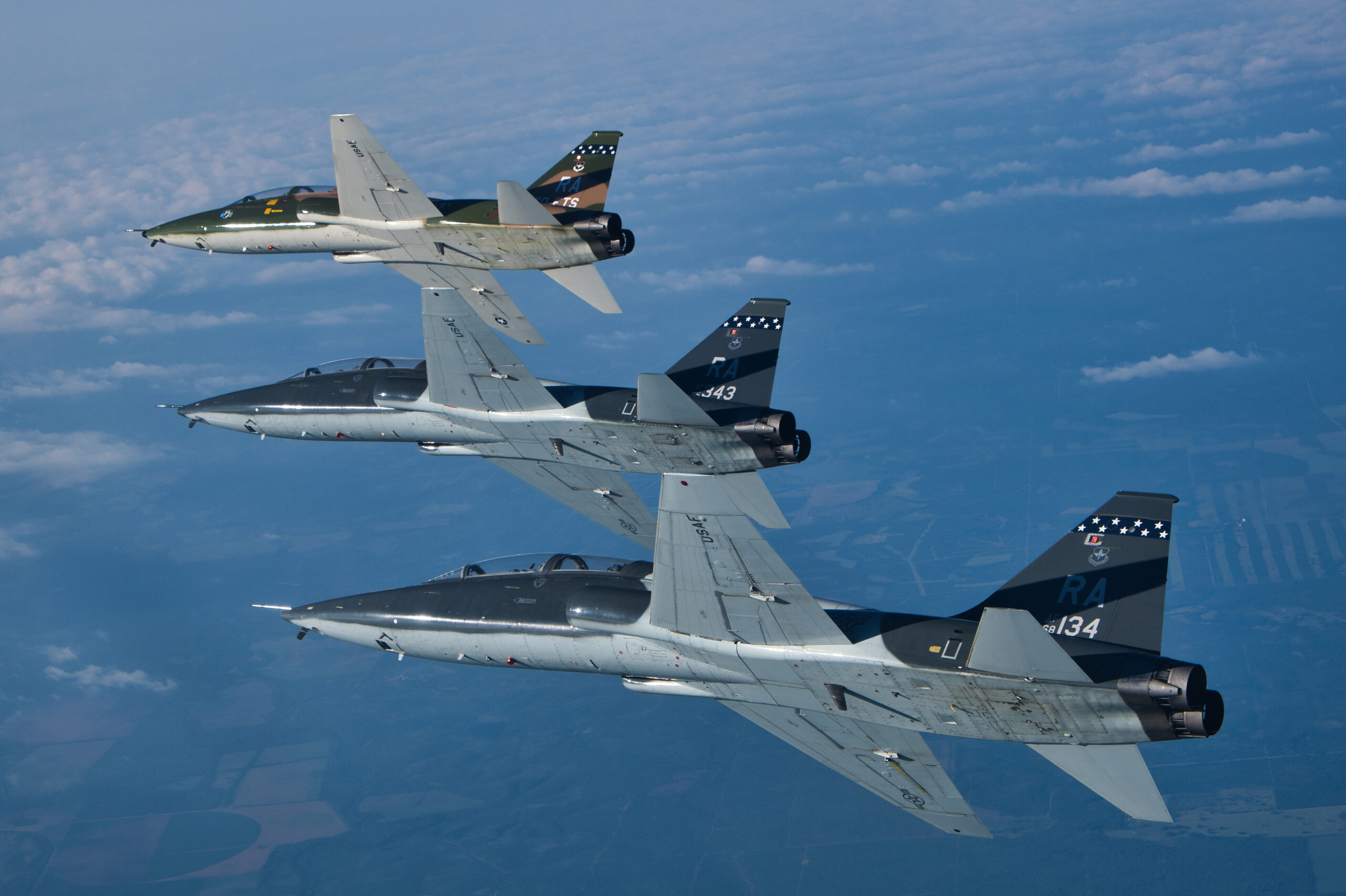 Pilots assigned to the 560th Flying Training Squadron fly in an echelon formation over a military operations area in T-38C Talon's from Joint Base San Antonio-Randolph, Texas, May 31, 2019. The 560th FTS uses the T-38C to teach students pilot instructor training and introduction to fighter fundamentals. (U.S. Air Force photo by MSgt Christopher Boitz)
