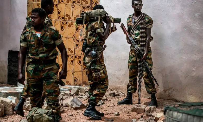 A group of heavily armed Ethiopian soldiers deployed in Somalia as part of the African Union peacekeeping mission patrol in Beledweyne, Somalia